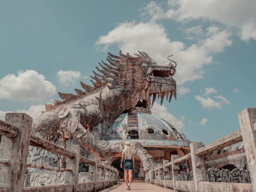 is Ho Thuy Tien worth visiting? Huge concrete dragon over dome structure in Vietnam.