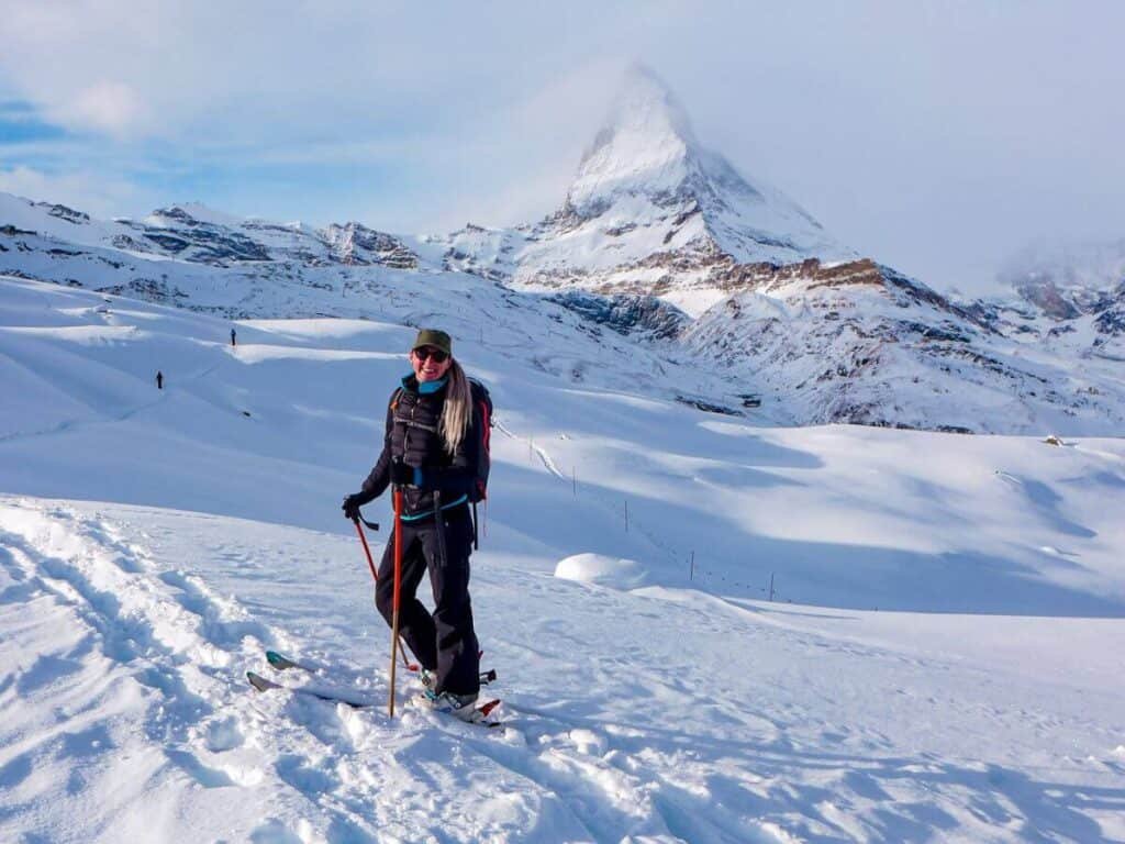 Teri-Anne standing on her off piste skis in front of the Matterhorn.