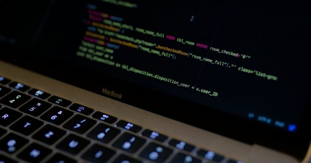 Web code language on a Macbook laptop.